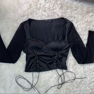 Black lace up satin mesh long sleeve top
